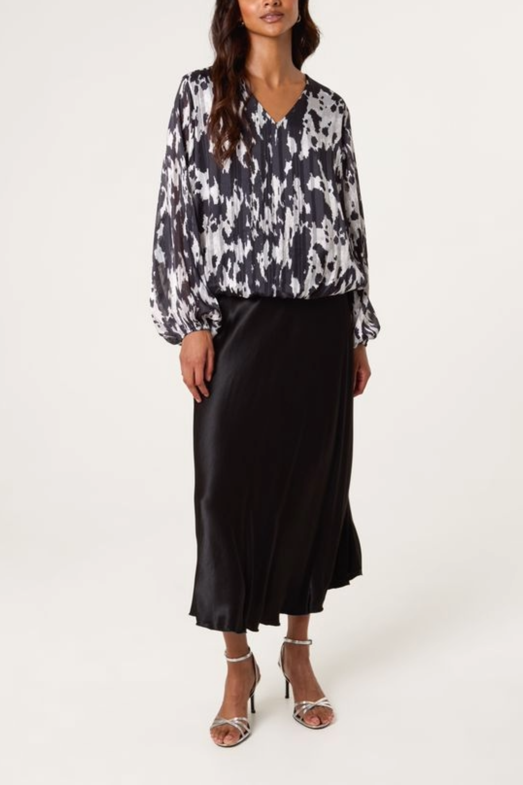 Cow Print Bubble Hem Blouse