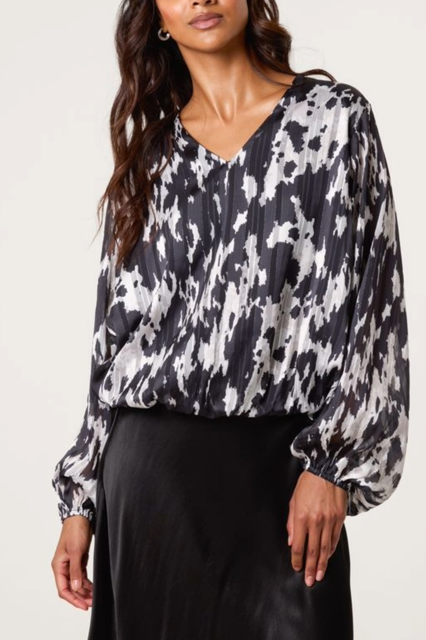 Cow Print Bubble Hem Blouse